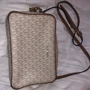 Michael Kors “the Ginny” crossbody bag.